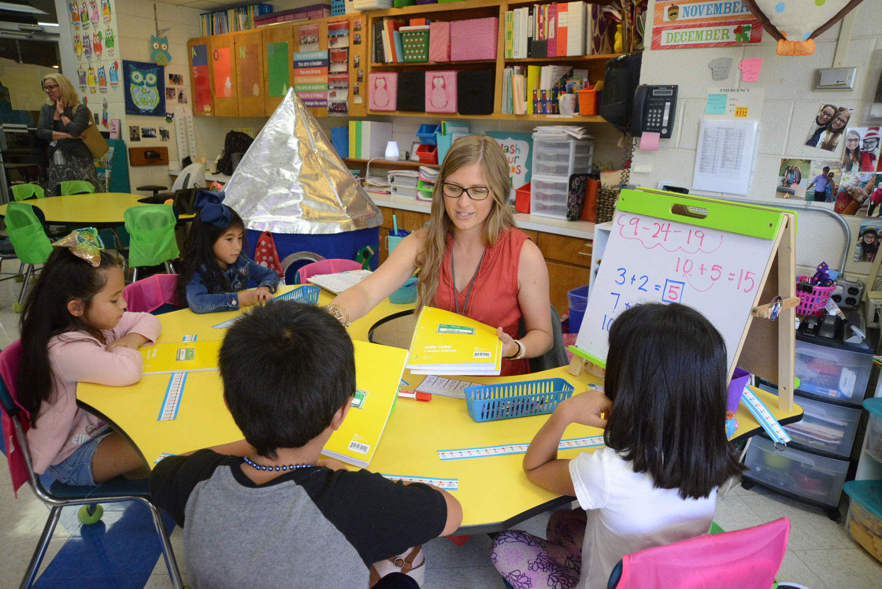 Lauren Thompson works with first grade students at Robbins Elementary School.